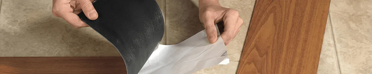 A professional installing vinyl flooring in Allentown, PA